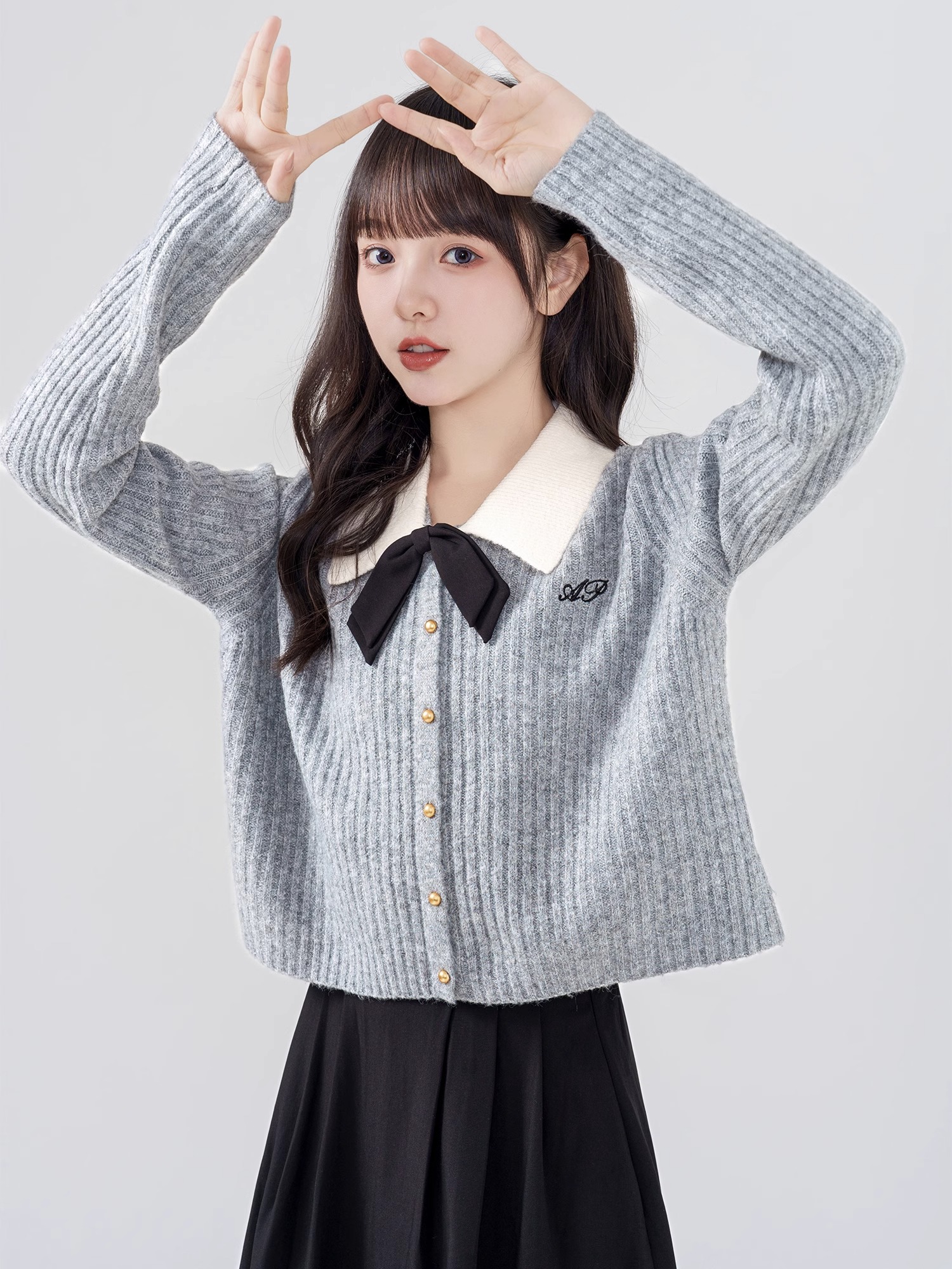 2023秋冬新款翻領蝴蝶結針織開衫女學院風小眾撞色短款毛衣