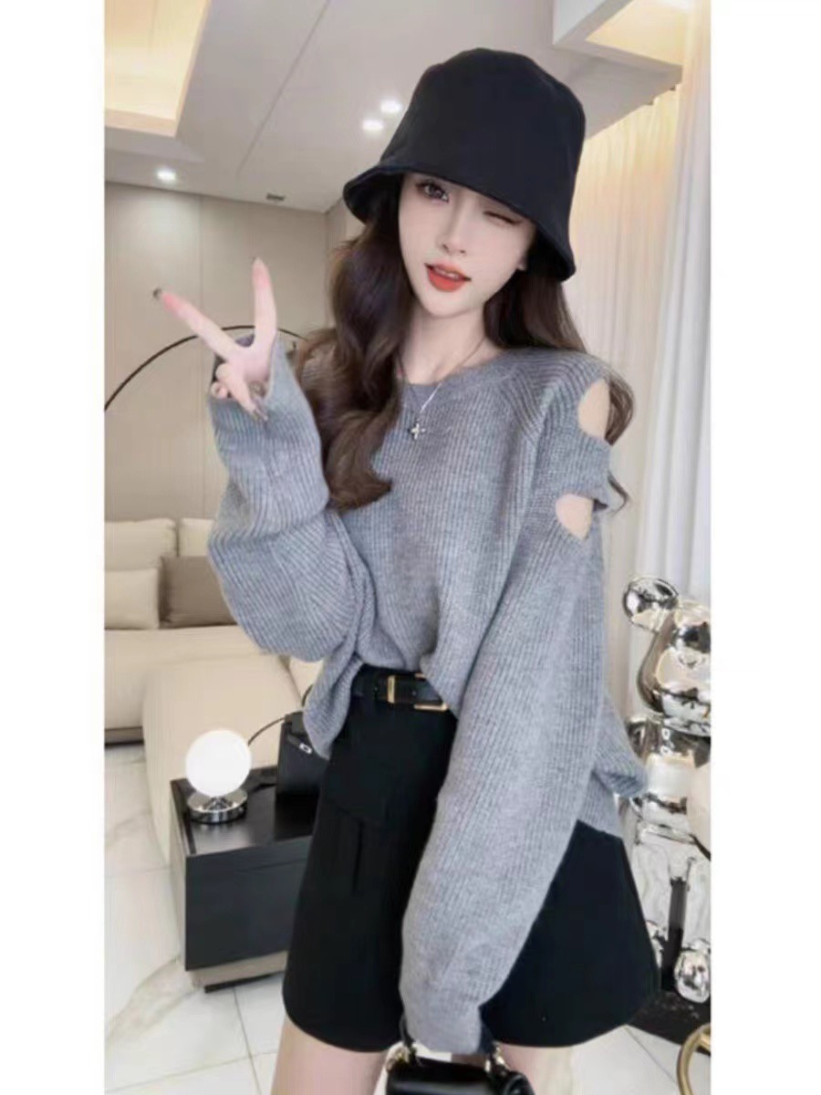 秋季新款設計感破洞袖子減齡純色針織毛衣女慵懶風寬鬆長袖上衣潮