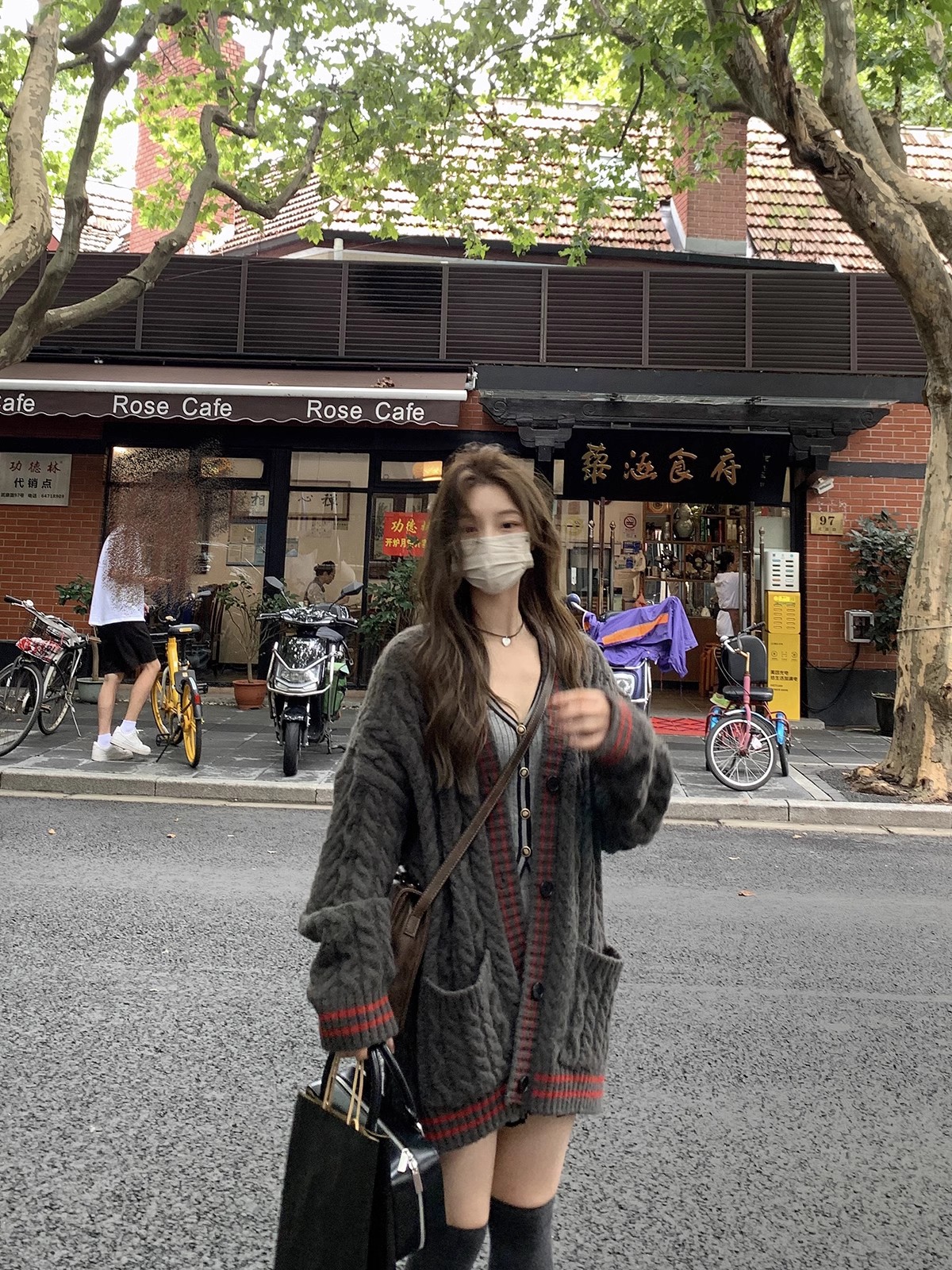 Prodigal Xiaoxie studio twist sweater cardigan jacket women's mid-length autumn new commuting all-match top