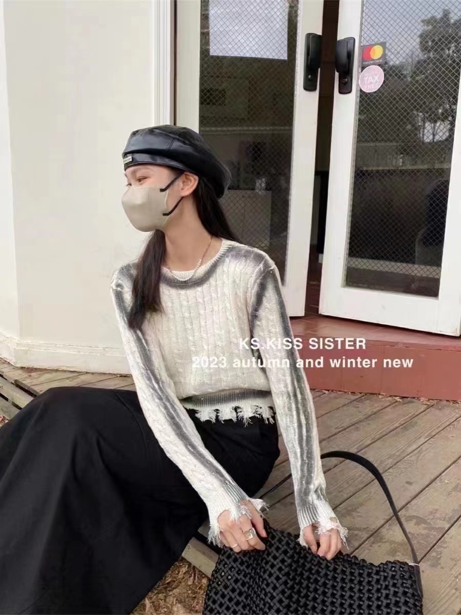 2023秋季歐貨新品破洞流蘇設計感長袖毛衣女純色休閒針織套頭上衣