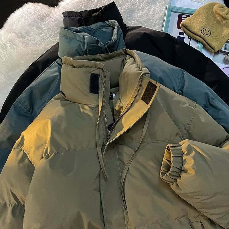 Winter stand collar down jacket loose oversize jacket short couple versatile casual thickened bread coat for women