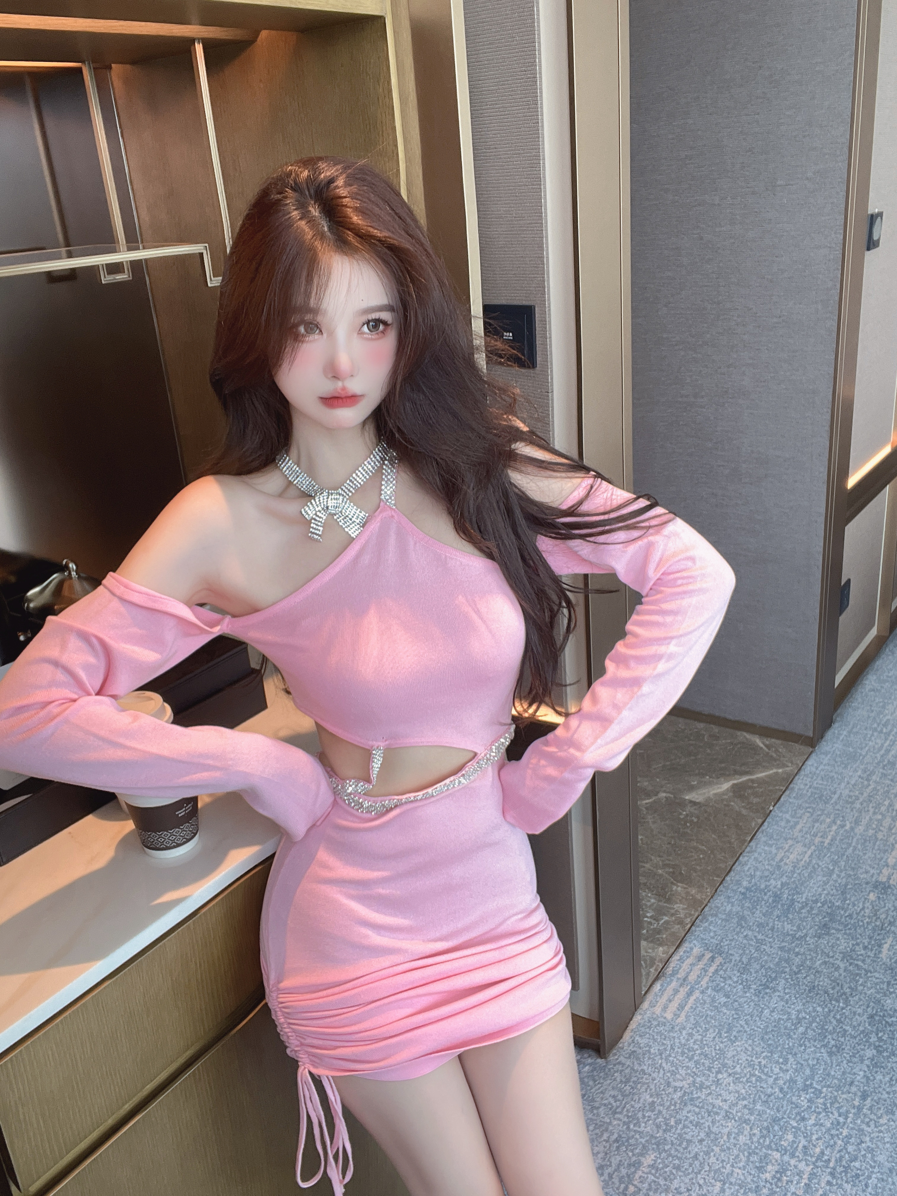 Actual shot of the new sweet and spicy pure lust style hollow suspender hip-covering sweater, slim and unique, heavy beading for women
