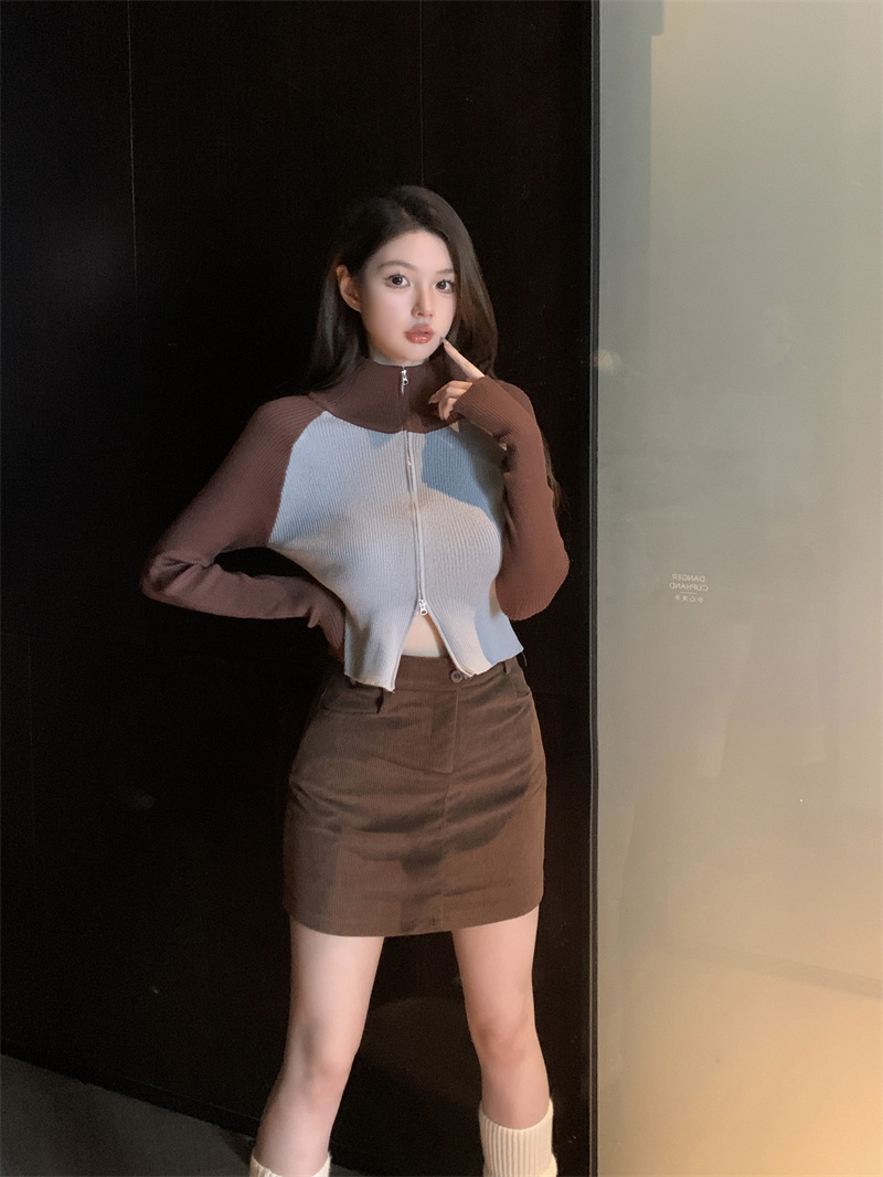 Real shot of Maillard wearing a high-neck knitted cardigan with a zipper and retro contrasting raglan sleeve sweater jacket