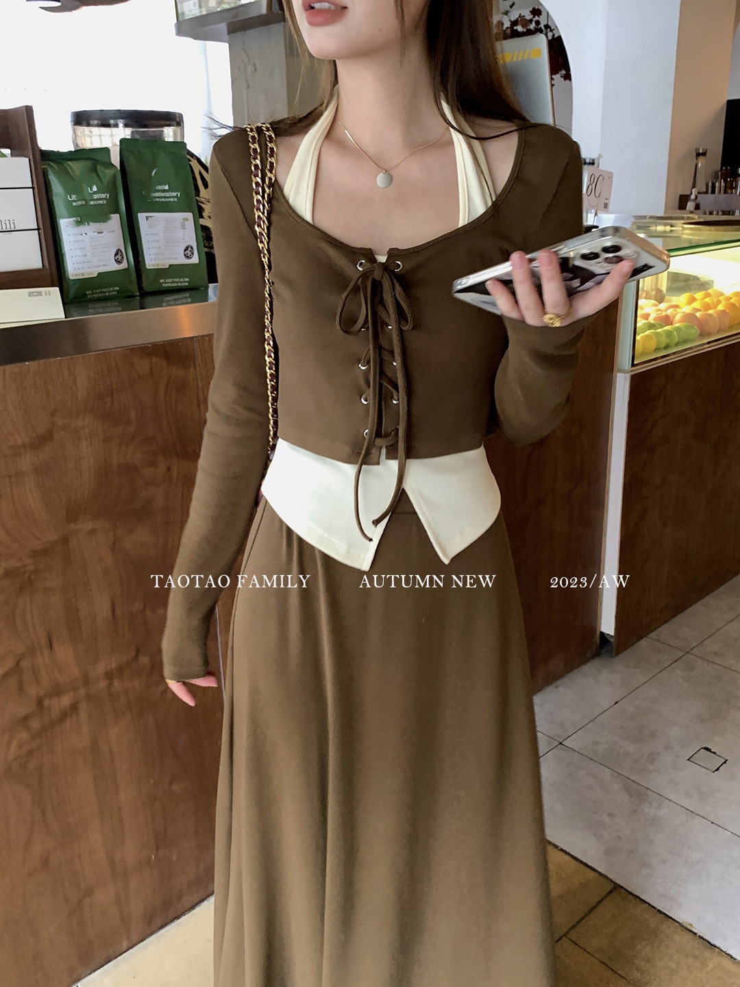 Korean style simple commuting suit for women in autumn new hot girl halter neck with strappy top and skirt three-piece set