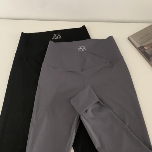 Actual shot of early autumn seamless cross-over Barbie pants that raise hips, high waist and tighten belly, yoga sharkskin leggings and trousers