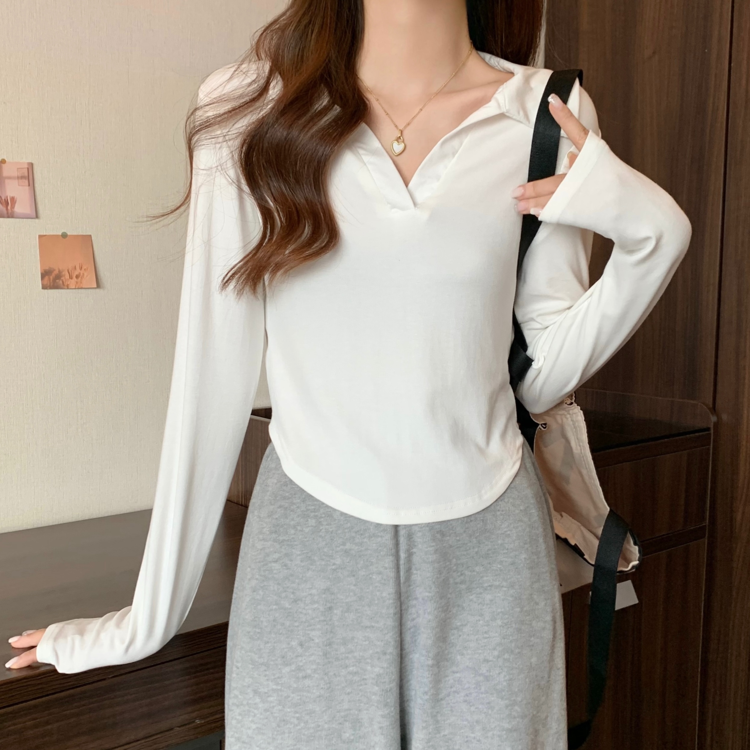 Long-sleeved T-shirt women's new autumn Korean style lapel irregular top hot girl slim fit versatile bottoming shirt