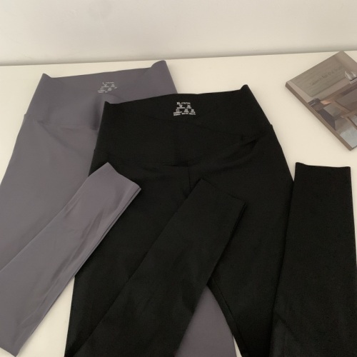 Actual shot of early autumn seamless cross-over Barbie pants that raise hips, high waist and tighten belly, yoga sharkskin leggings and trousers