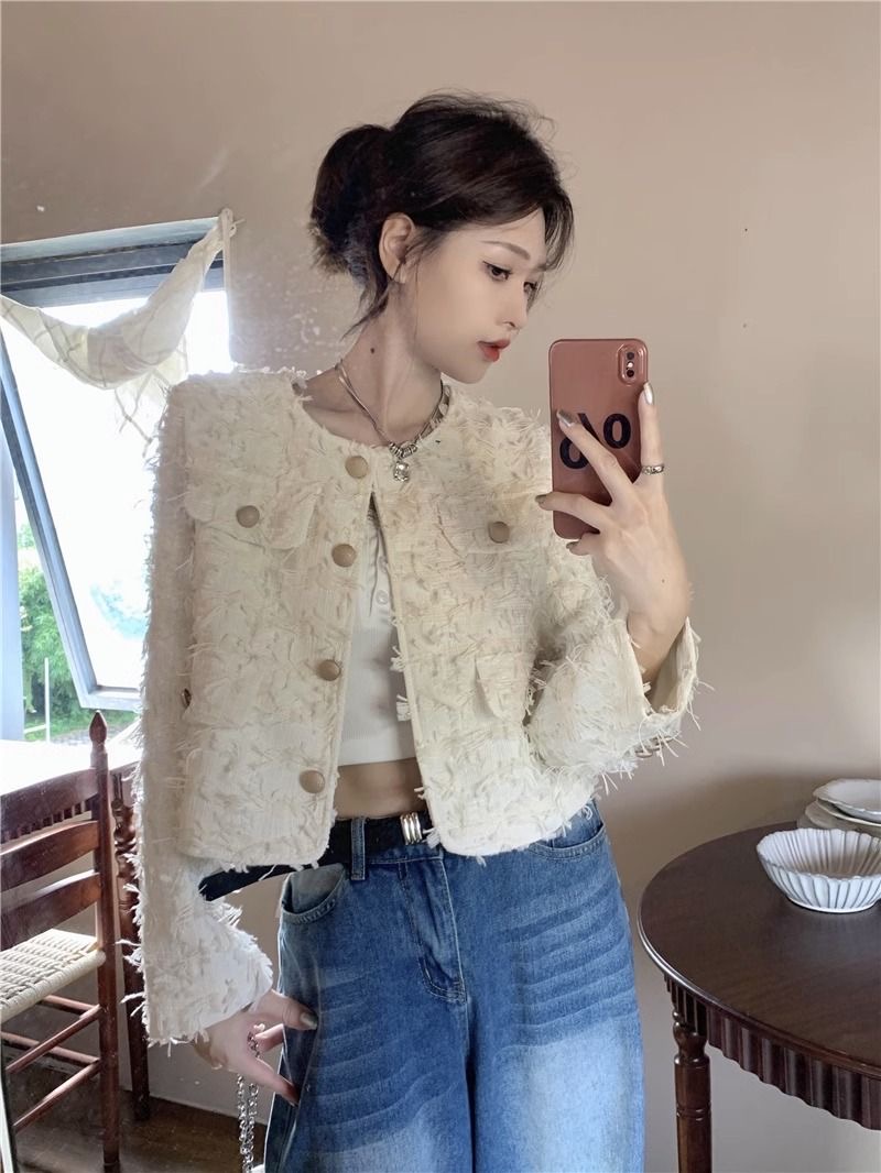 Xiaoxiangfeng short coat for women in autumn 2023 new temperament tassel design niche loose and chic long-sleeved top