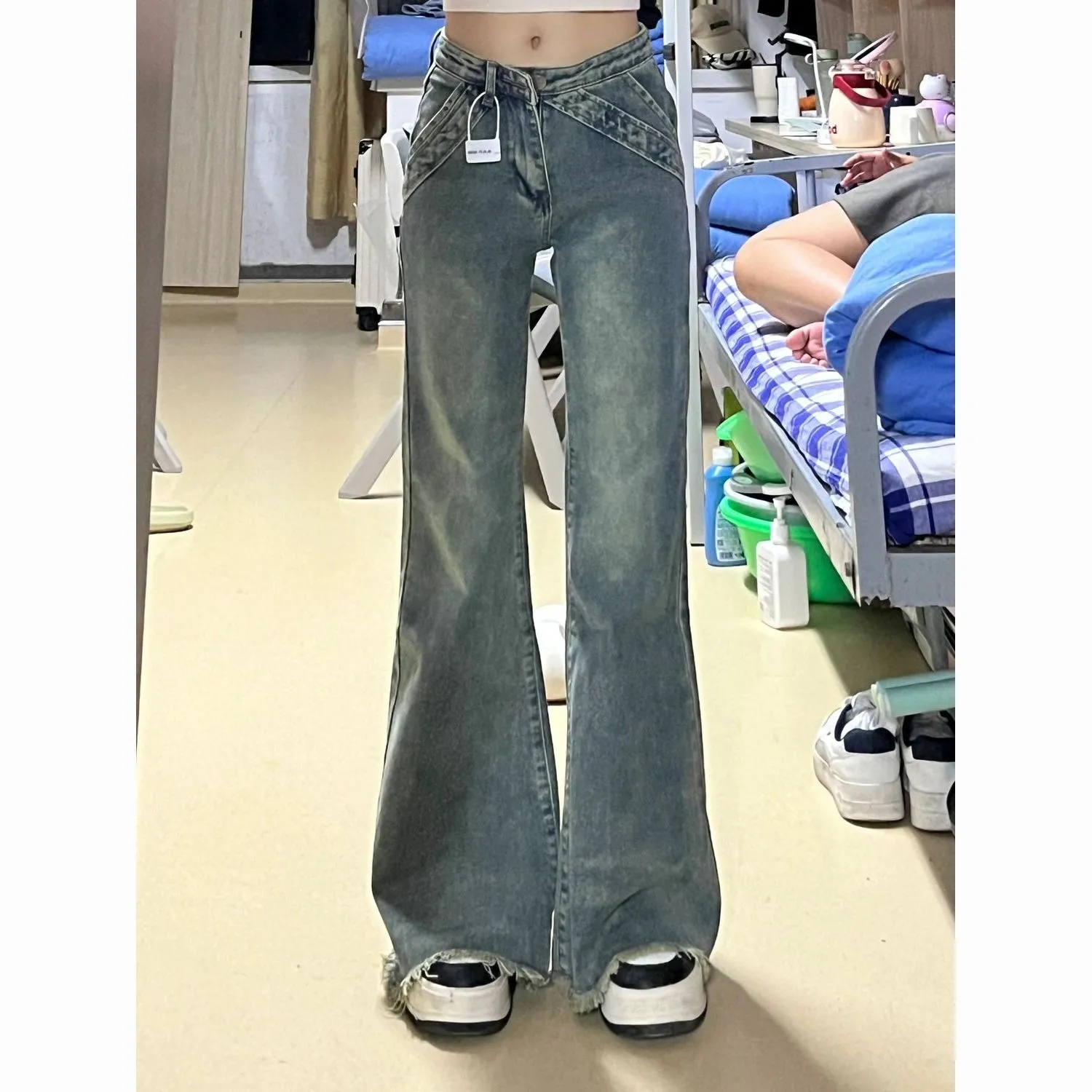 寬鬆微喇牛仔褲女秋季新款低腰顯瘦設計感水洗毛邊拖地褲子