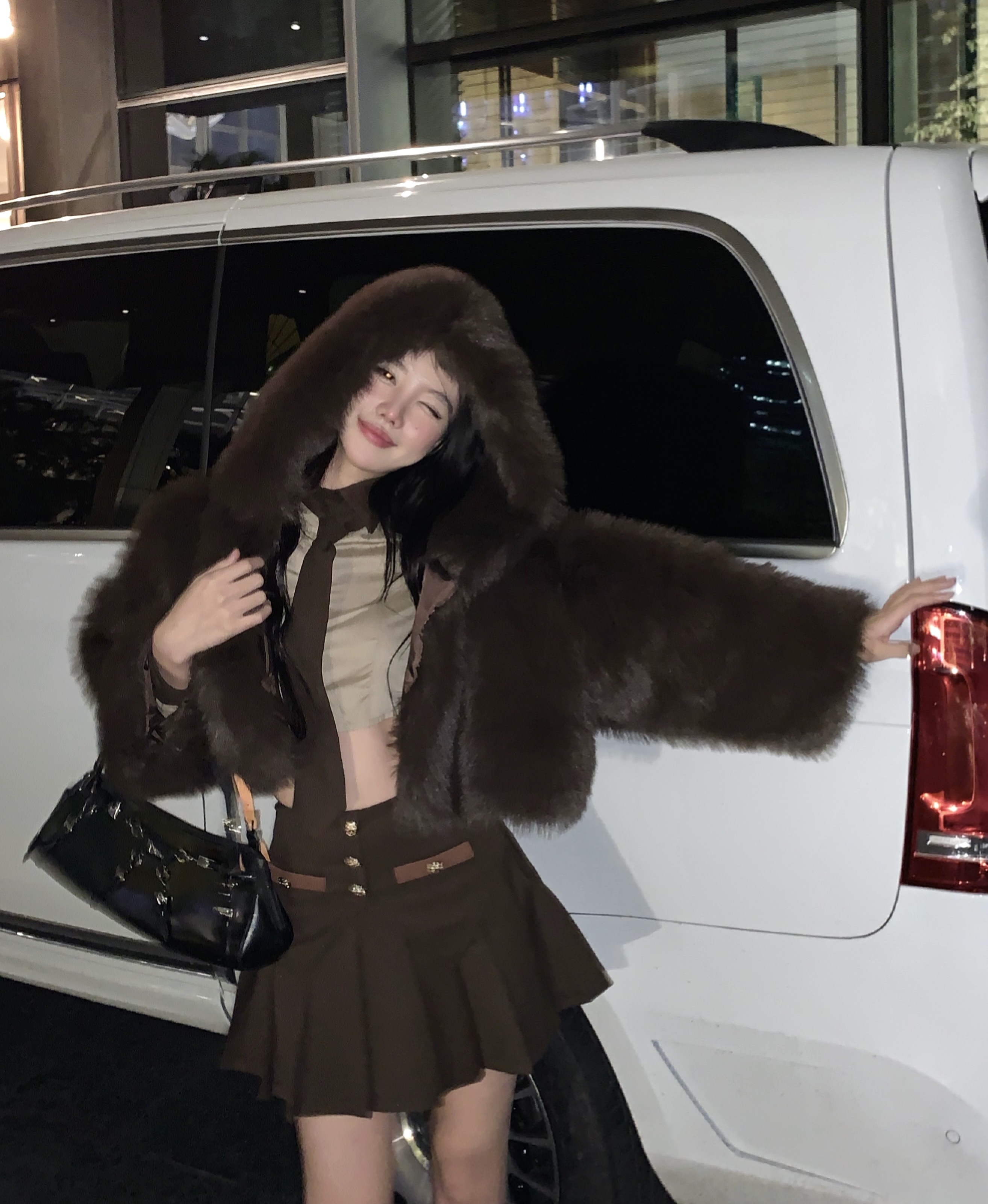 Actual shot of brown eco-friendly fur hooded plush jacket + contrasting short shirt + tie + pleated skirt for women