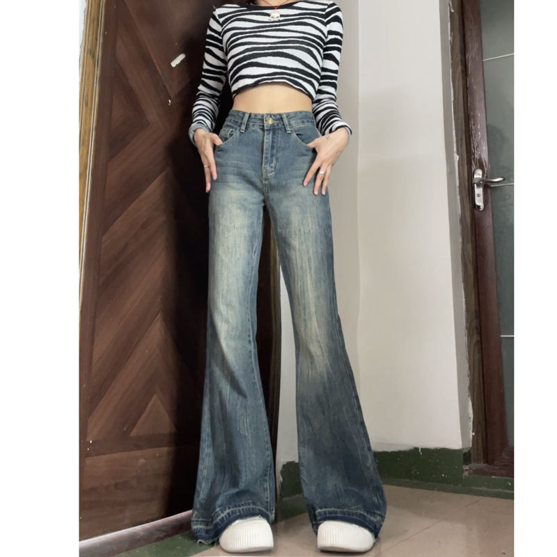 美式復古顯瘦微喇叭牛仔褲女秋季新款寬鬆毛邊垂感拖地闊腿長褲子