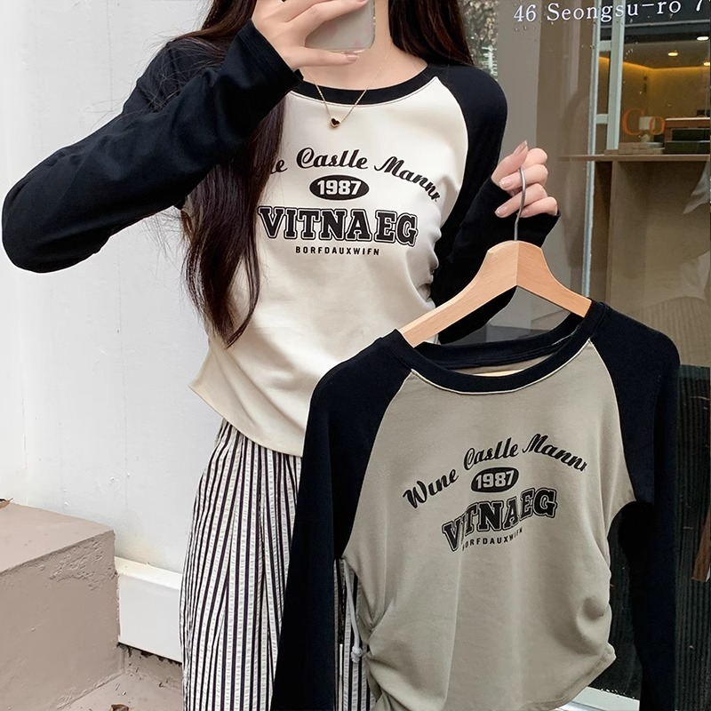 Designed drawstring slimming long-sleeved T-shirt for women in spring and autumn. This year's popular belly shirt is a short raglan top.
