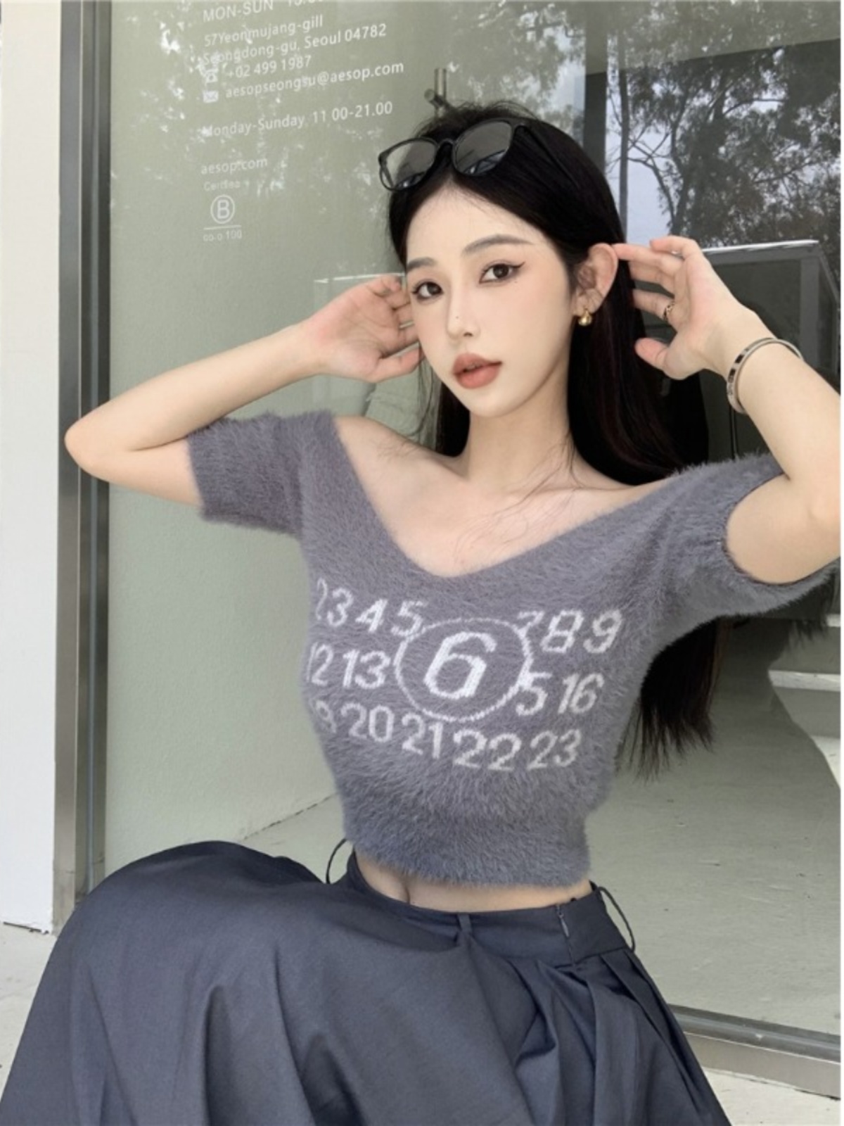 秋季獨特别致甜辣妹性感短款露臍上衣設計感小眾短袖v領針織衫女