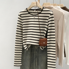 Photographed front view round neck long sleeve striped contrasting color knitted base shirt women stylish youthful upper garment