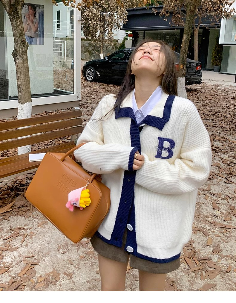 橘子樹在哪兒白色奶系撞色毛衣開衫女秋季寬鬆設計感溫柔線衫外套
