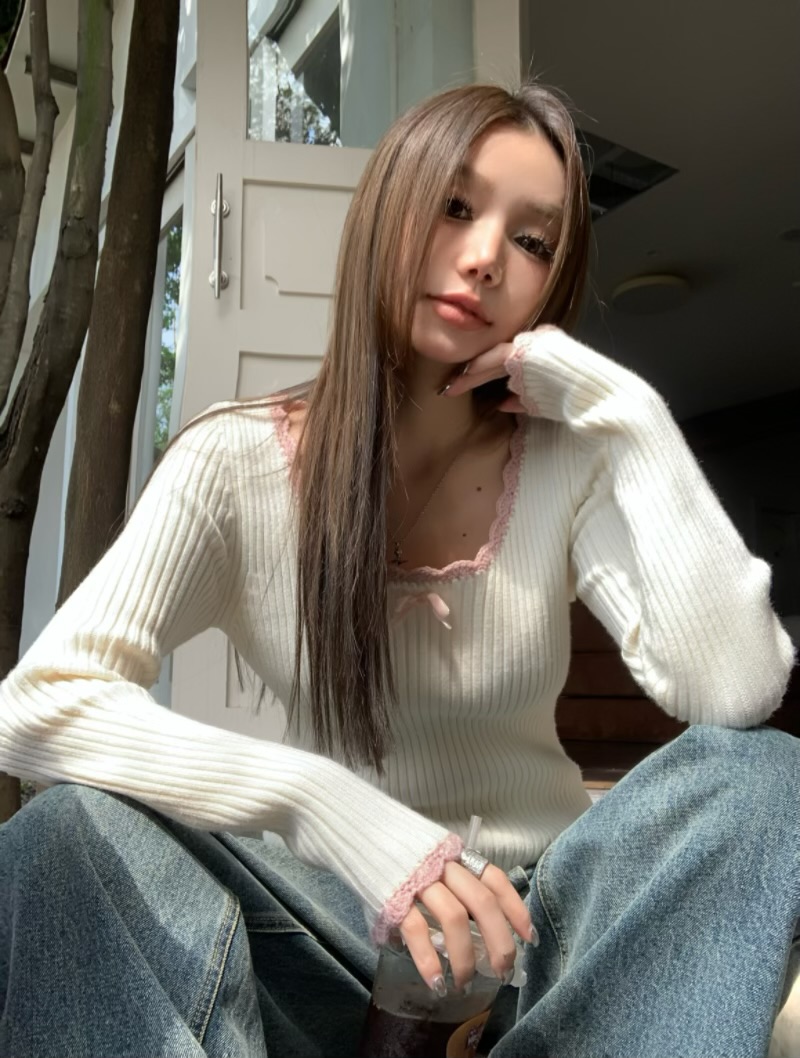 實拍少女感慵懶內搭拼色蝴蝶結鈎花毛衣