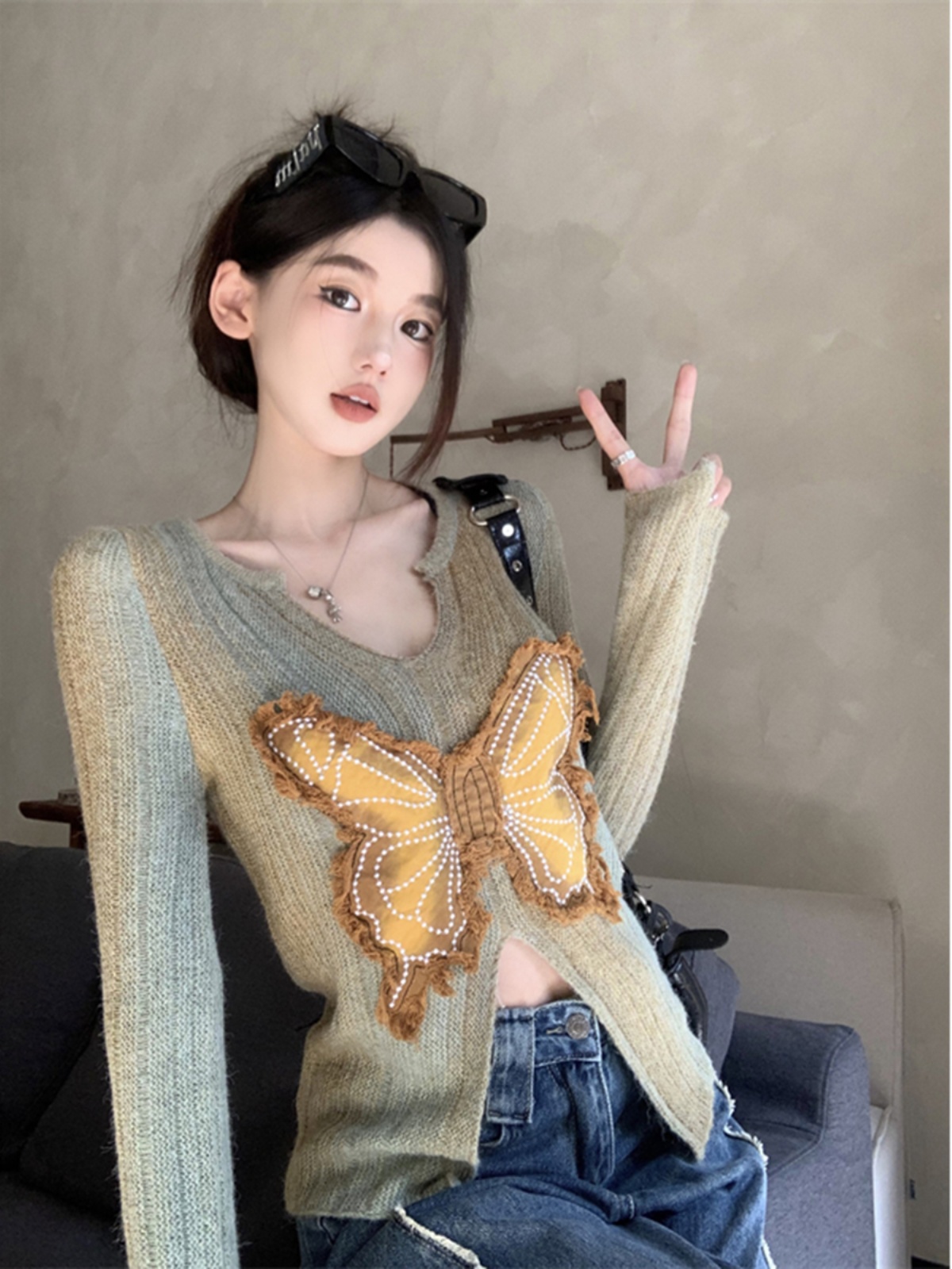 辣妹開叉修身長袖針織衫女裝秋季新款蝴蝶設計感顯瘦打底毛衣上衣