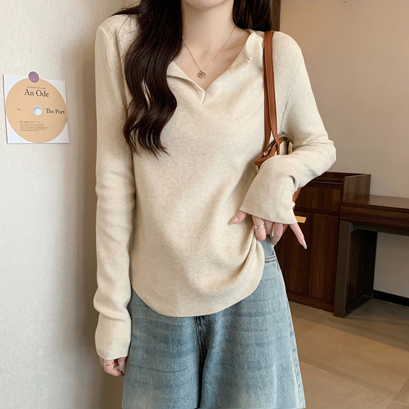 Real shot of autumn and winter Korean style loose core-spun yarn V-neck fake two-piece long-sleeved top warm knitted sweater for women