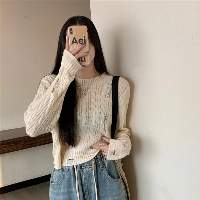 Real shot of ripped short long-sleeved sweater for women in autumn and winter new design niche loose outer knitted top