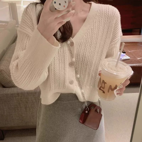 Women's  new autumn style age-reducing fashionable temperament knitted sweater cardigan V-neck hollow loose top