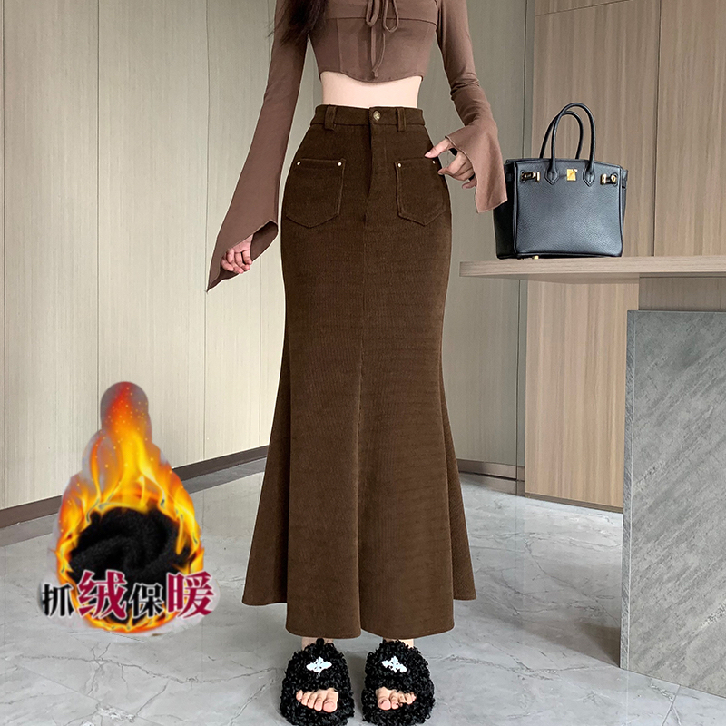Plus velvet brown corduroy fishtail skirt for women autumn and winter slimming mid-length skirt with lotus leaf hem Korean style hip skirt