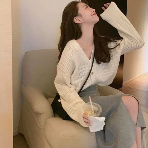 Women's  new autumn style age-reducing fashionable temperament knitted sweater cardigan V-neck hollow loose top