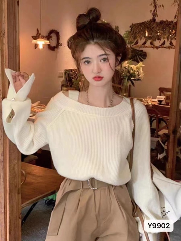 設計感小眾心機露肩毛衣女春秋冬溫柔軟糯寬鬆短款粉色針織衫上衣