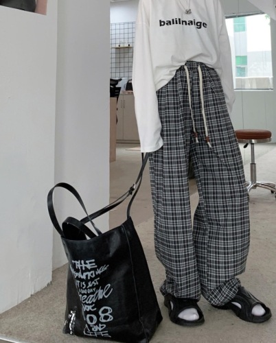 Real shot of winter plaid straight casual pants with elastic waist and drawstring feet and pleated small leg pants for women