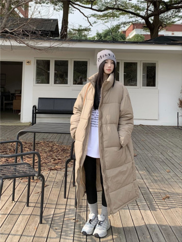 Actual shot of long knee-length down jacket for women in winter, new loose slimming thickened warm cotton jacket