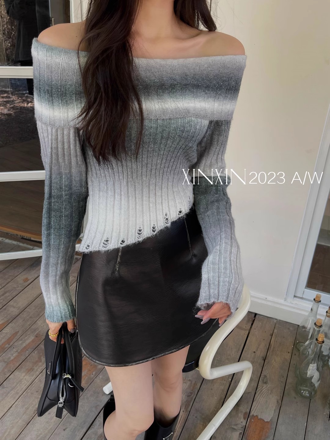 美式辣妹一字肩撞色針織毛衣女秋季2023新款不規則設計感短款上衣
