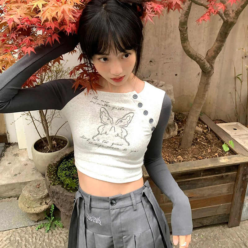 天貓質量 辣妹斜肩紐扣長袖t恤女春秋季短款蝴蝶修身顯瘦百搭上衣