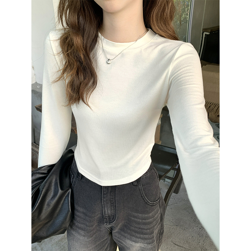 實拍不規則圓領長袖t恤女秋冬純色打底緊身收腰短款正肩上衣