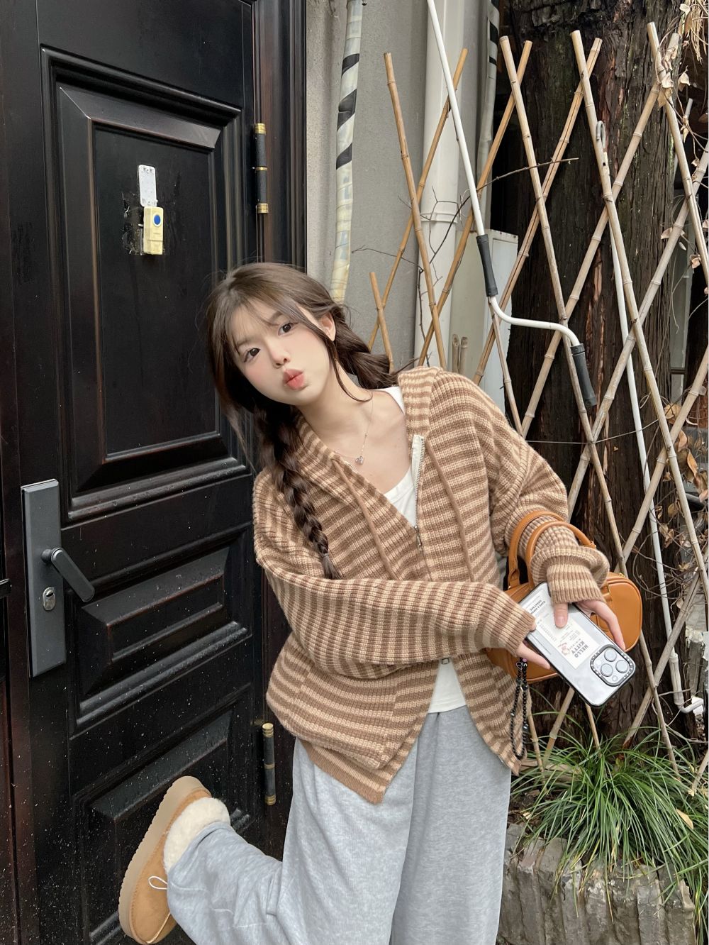 Real shot of three standard loose and lazy striped hooded zipper sweater jacket for women