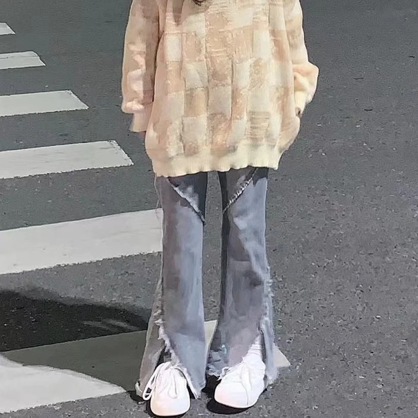 韓版高街開叉毛邊牛仔褲女冬季新款ins寬鬆學生顯瘦直筒闊腿長褲