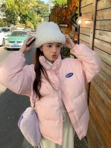 Actual shot of women's winter versatile loose and thickened warm pink stand-up collar cotton-padded jacket.