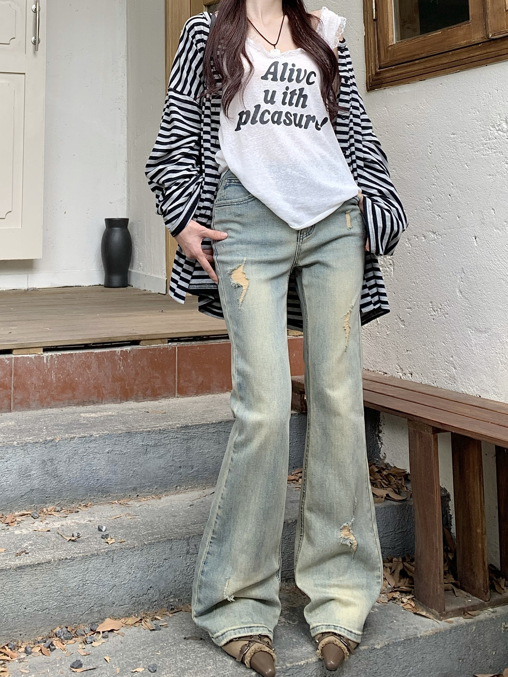 Actual shot of high-waisted retro design bootcut jeans
