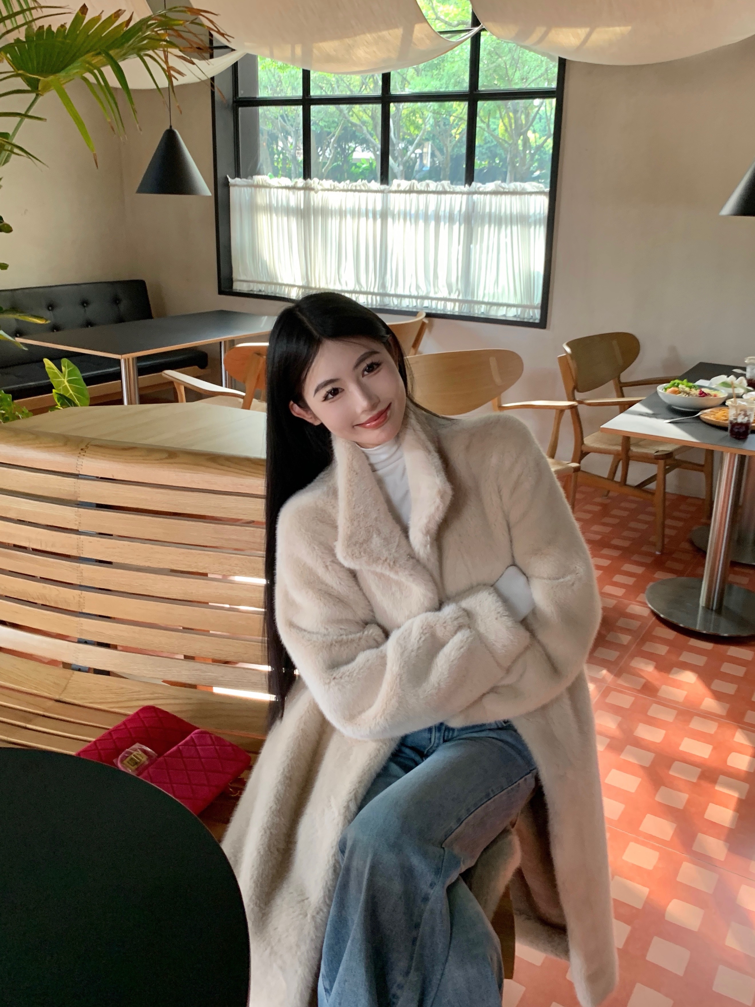 Actual shot of environmentally friendly fur coat, fur integrated mid-length slim coat