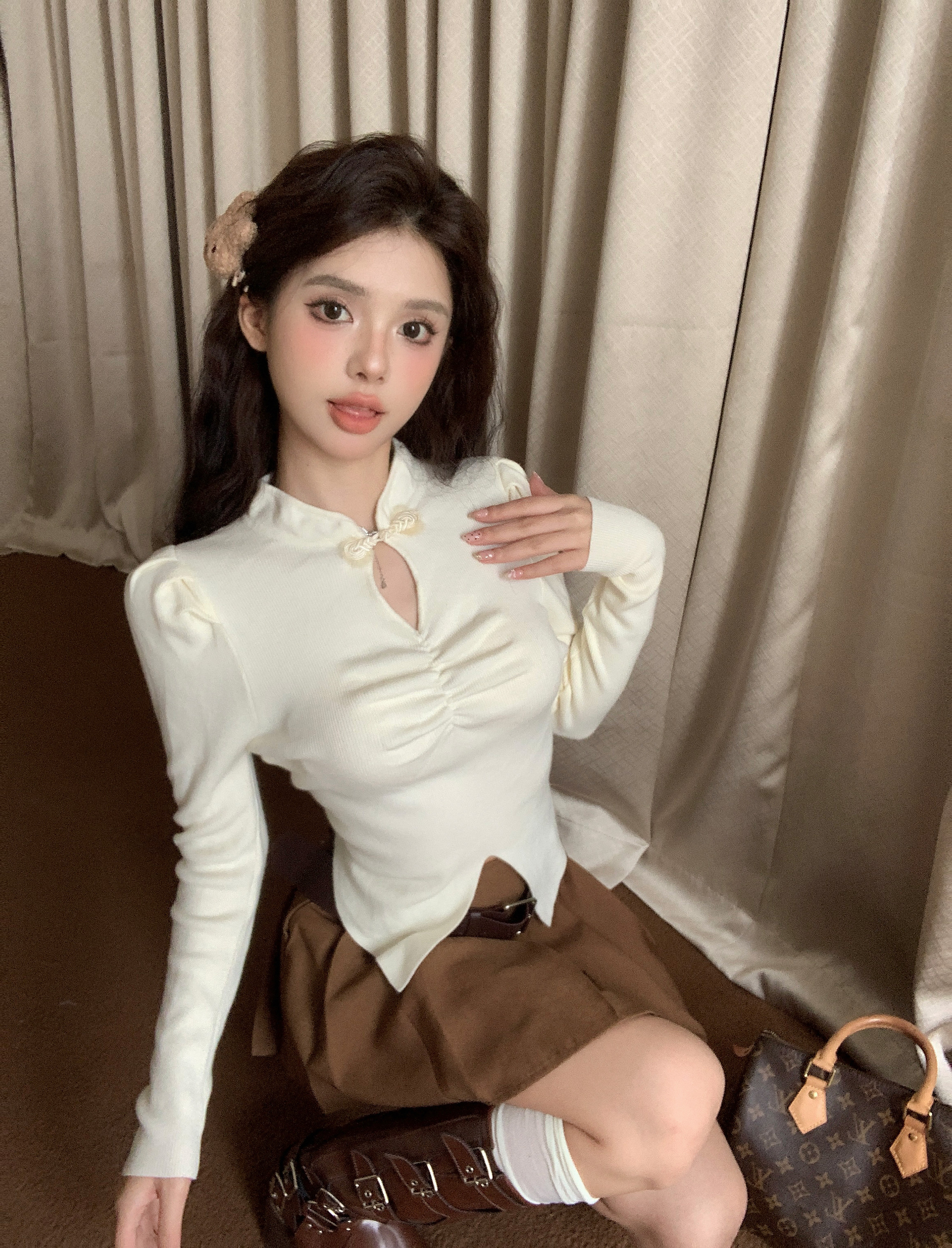 Actual shot ~ New Chinese style disc button stand collar sweater for women autumn and winter French puff sleeve irregular slimming sweater