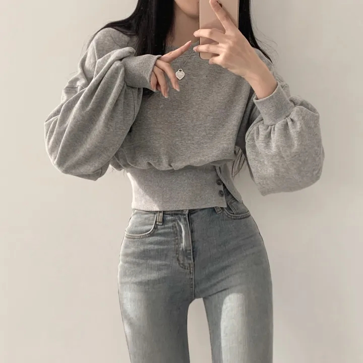 Korean chic autumn niche design round neck buttoned waist slimming long sleeve short pullover sweatshirt for women