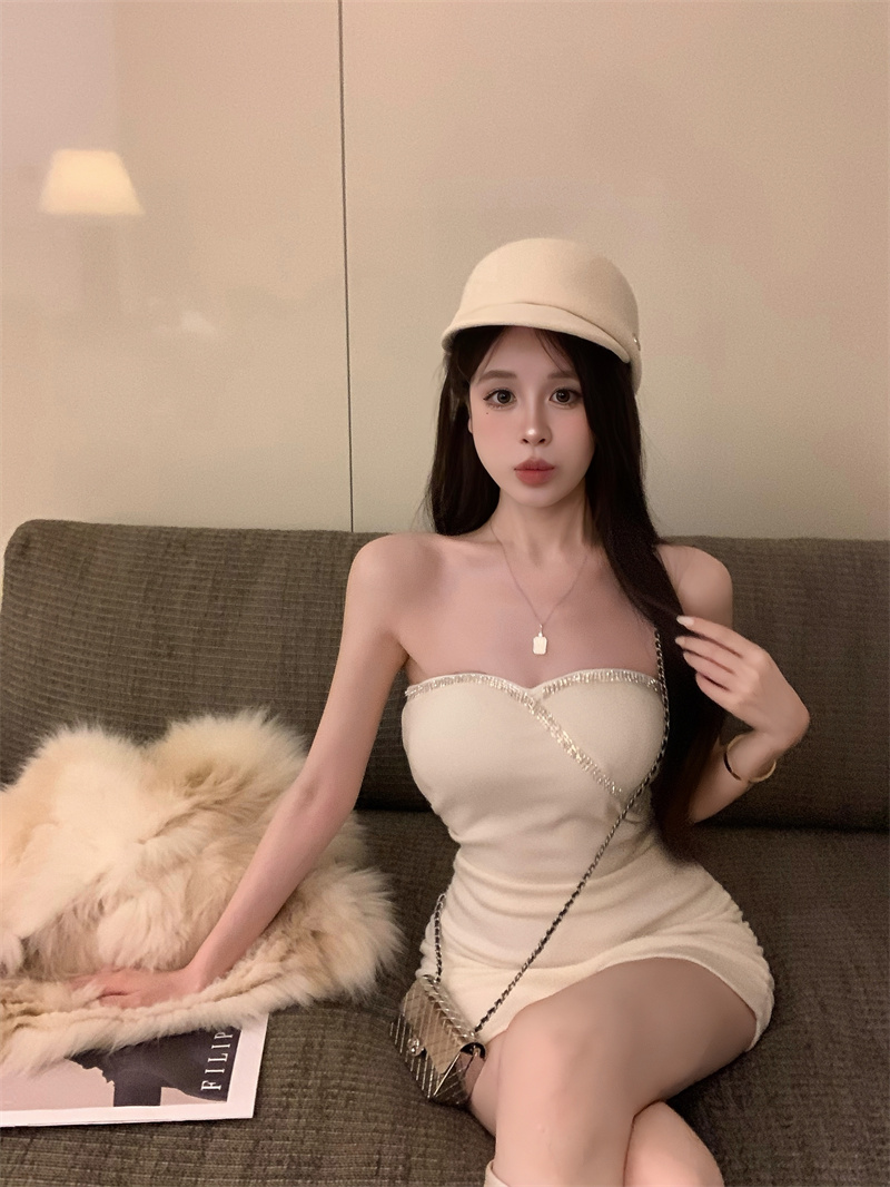 Real shot of hot girl in sexy tube top and hip skirt with diamond design
