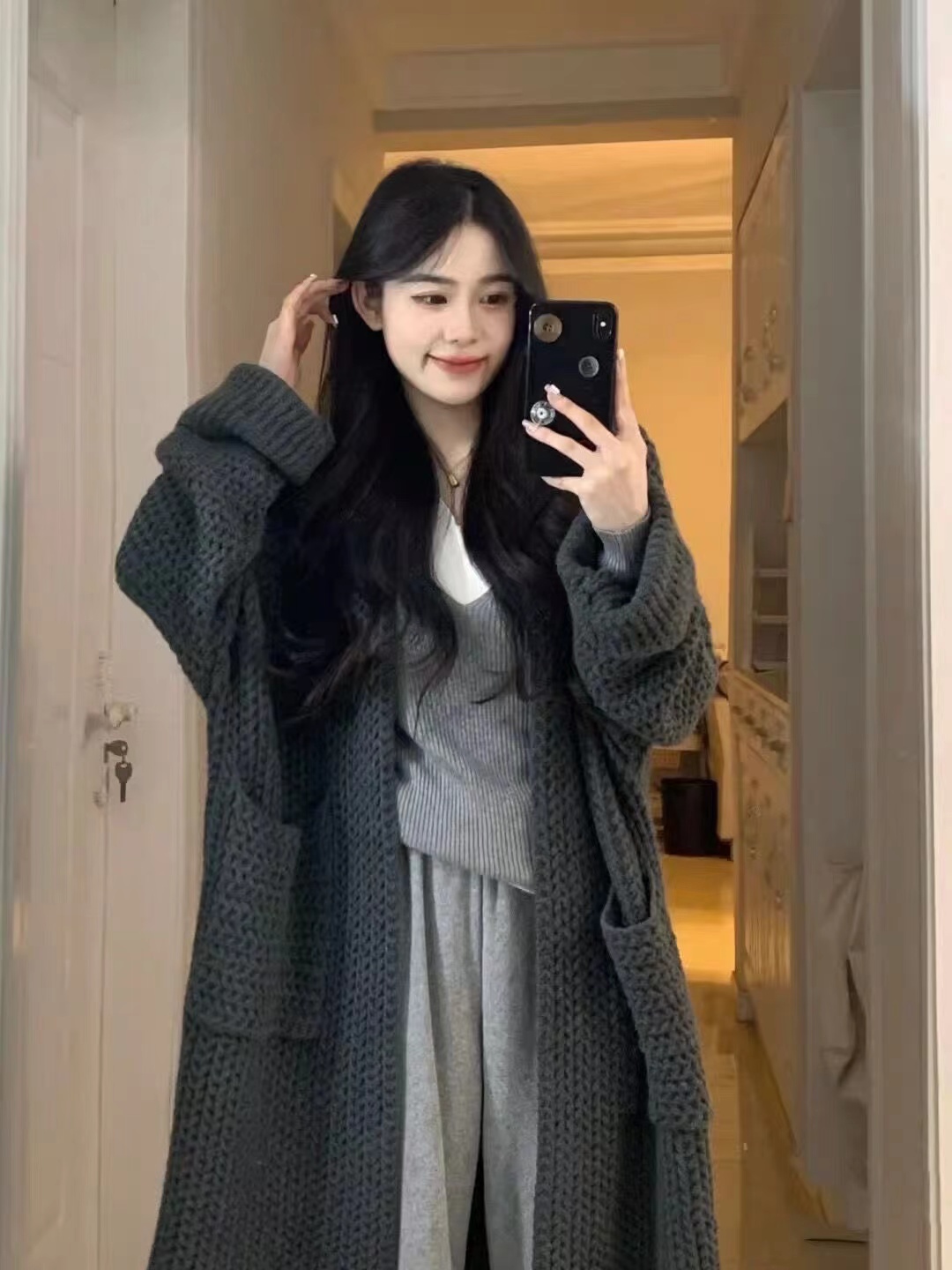 Thick knitted sweater women's design loose pocket coat versatile long over-the-knee cardigan hollow coat outer wear