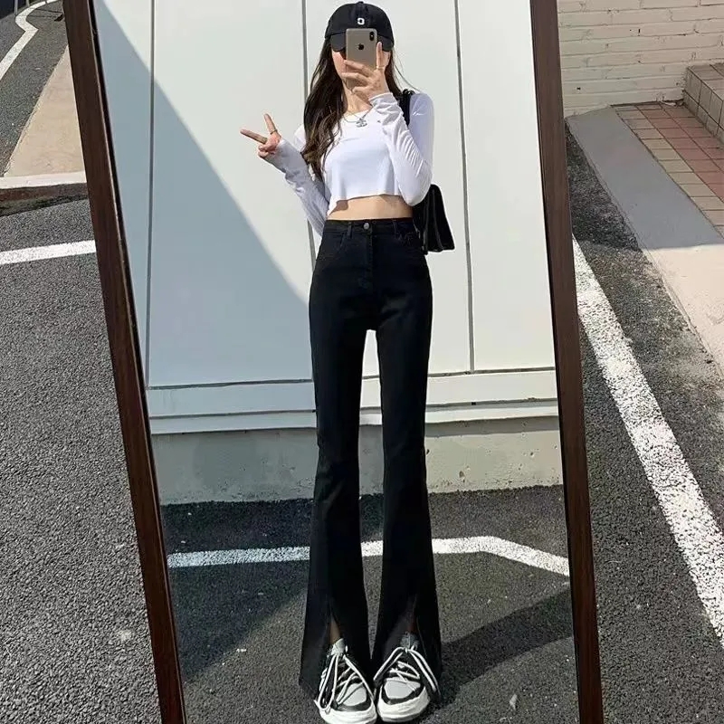 黑色開叉牛仔褲女春季2023年春裝新款高腰緊身顯瘦拖地微喇叭褲子