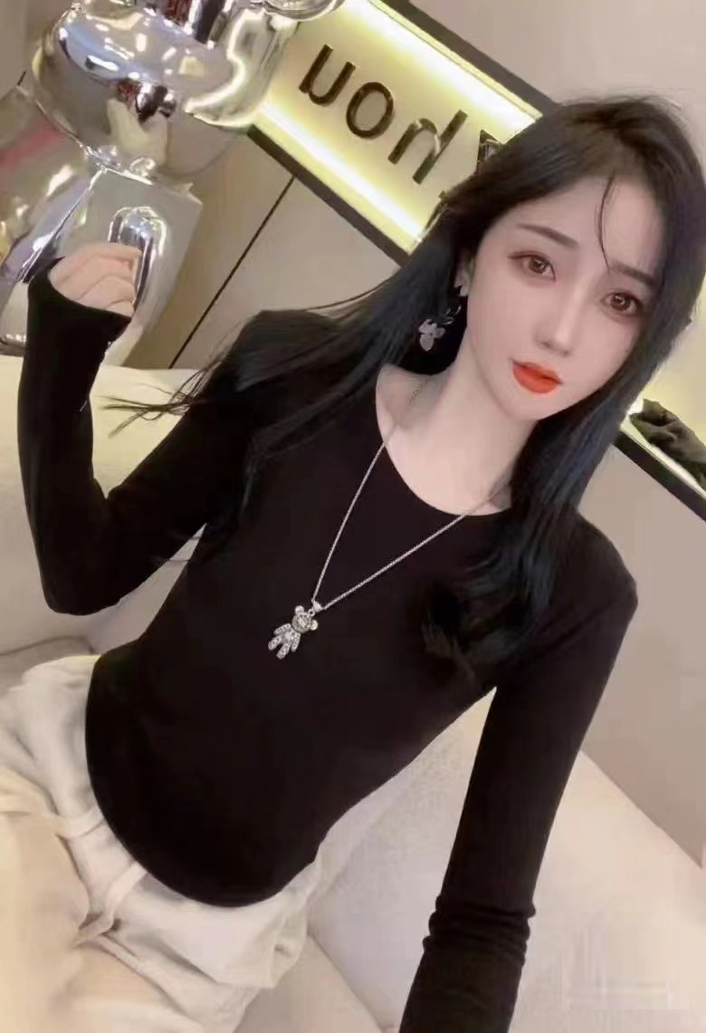 秋冬新款簡約圓領純色下擺弧形百搭長袖上衣女韓版針織衫上衣女