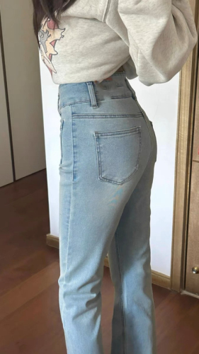 Light blue design micro-flare jeans for women, high-waisted and slim, autumn new style, slim and tall, trendy horse hoof pants for small people