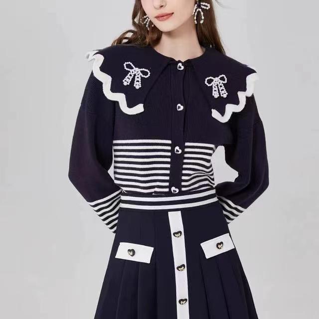 韓版女裝潮時尚氣質長袖2023年秋季新少女學院清新娃娃領針織開衫