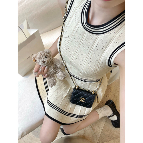 Tmall quality inner pleated skirt suit early autumn college style knitted vest cardigan small fragrant style skirt