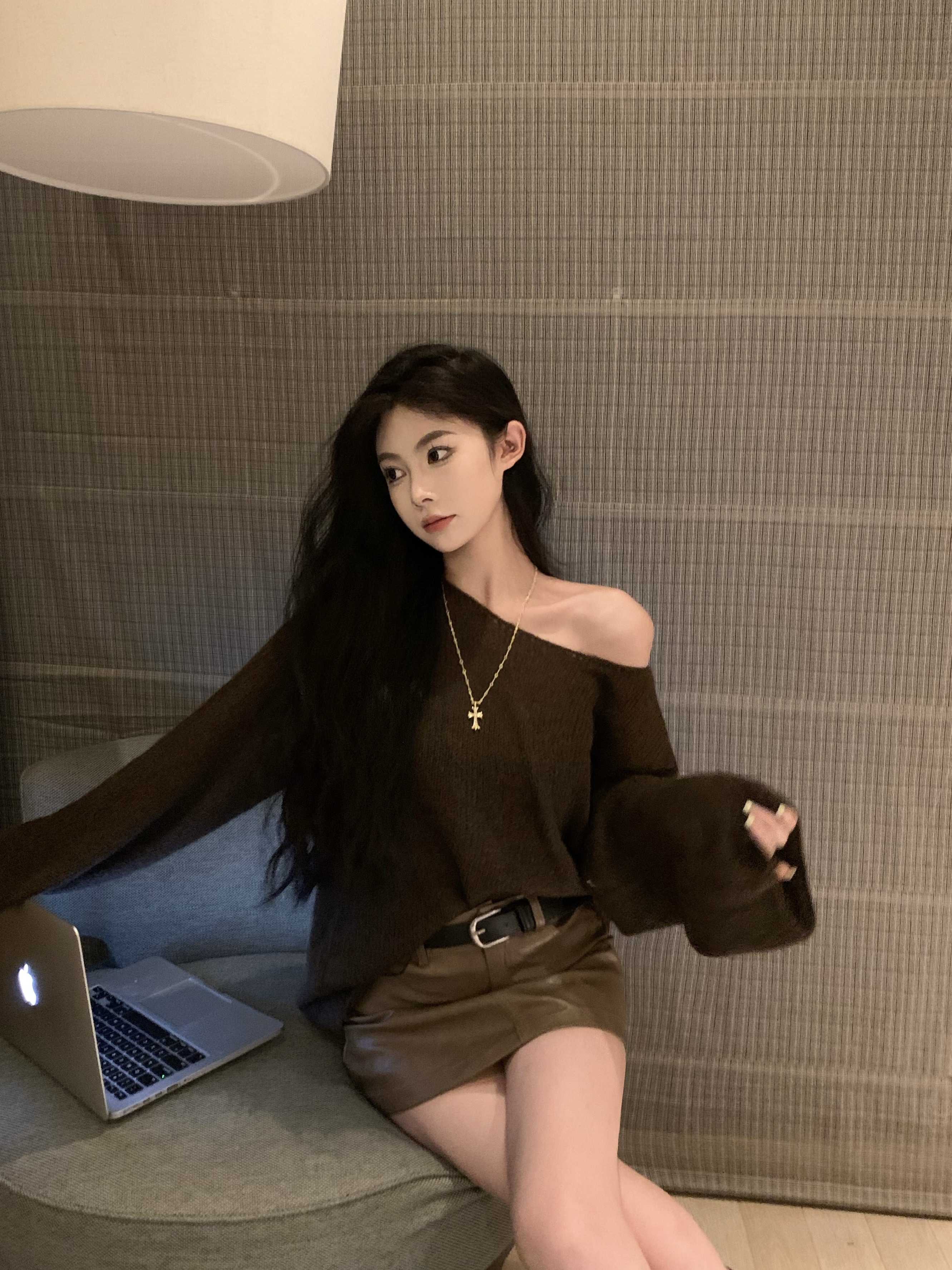 Actual shot of a lazy, loose-fitting sweater, a casual slimming off-the-shoulder top