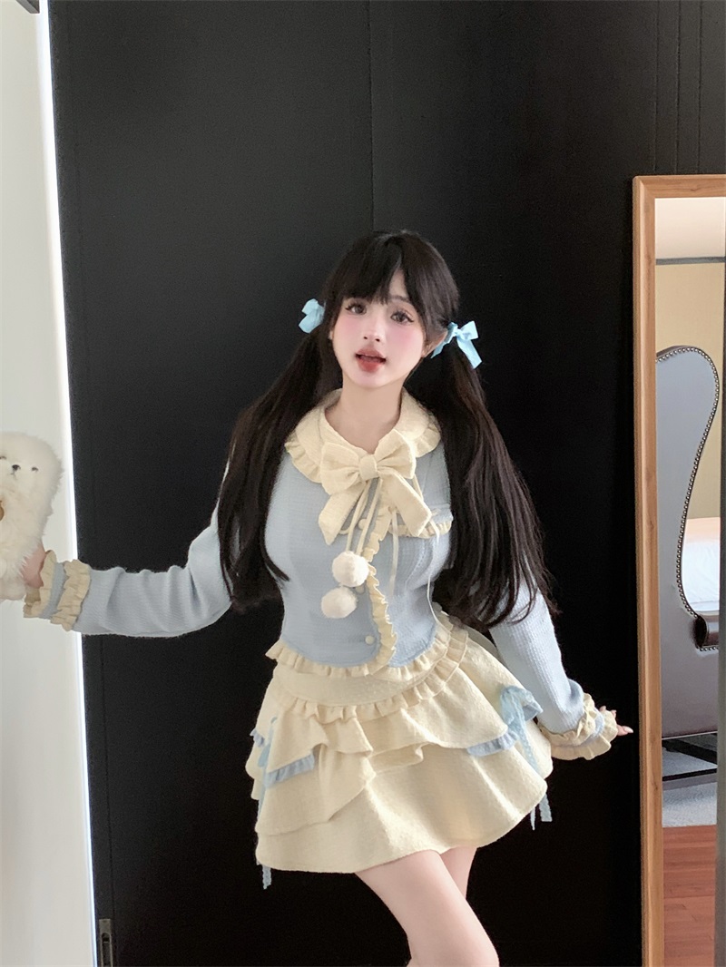 Actual shot of a blue fragrant top with a high-waisted skirt and a winter outfit paired with a complete skirt suit