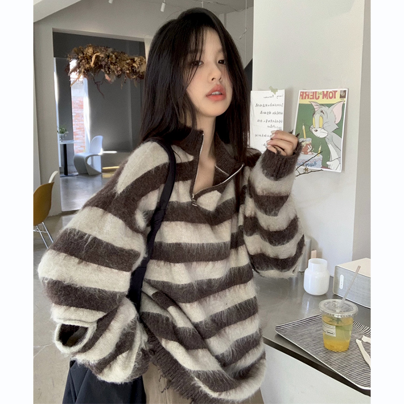 American retro niche design striped hole knitted sweater for women hollow autumn new chic fashion top