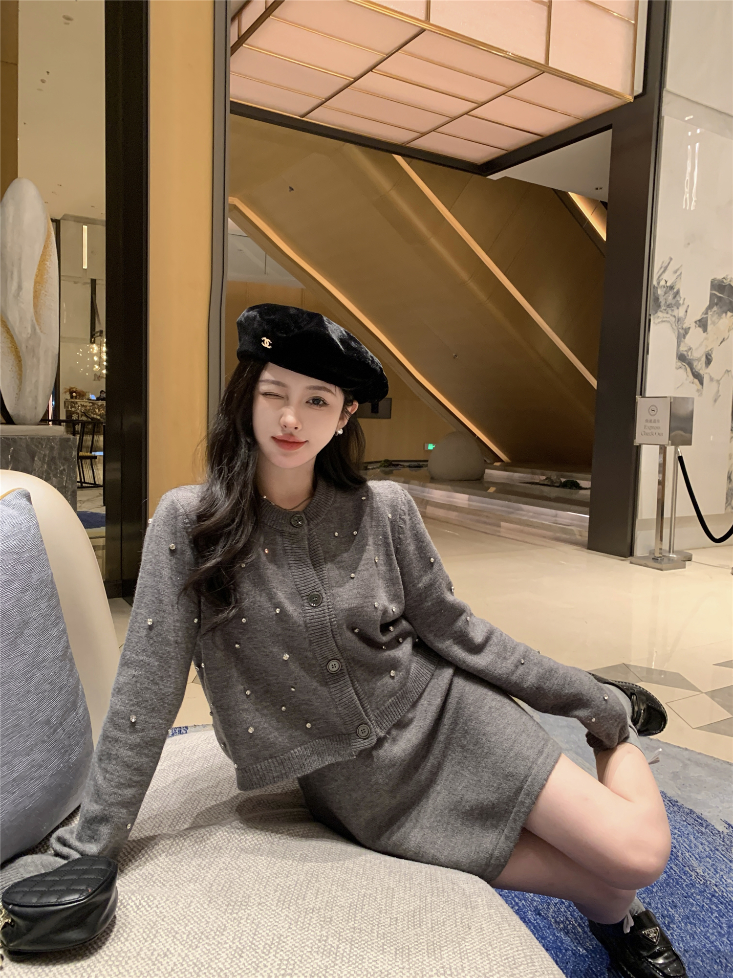 Actual shot ~ studded knitted long-sleeved cardigan top + hip-covering skirt suit
